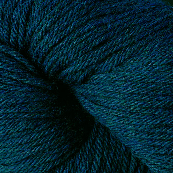 Berroco Vintage Worsted weight yarn in the color Tide Pool 5185, a dark heather with greens & blues.