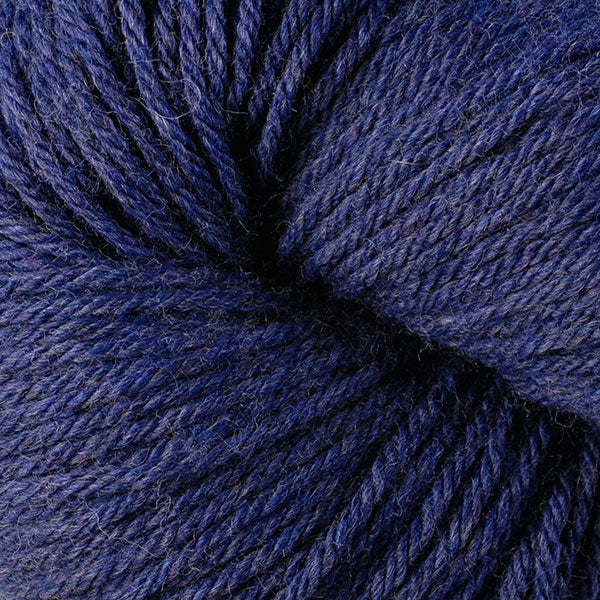 Berroco Vintage Worsted weight yarn in the color Dungaree 5187, a rich heathered dark blue.