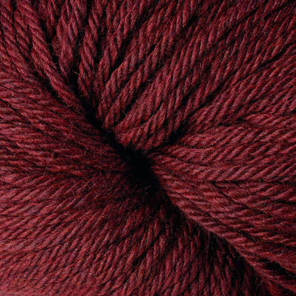 Berroco Vintage Chunky weight yarn in the color Black Cherry 6181, a dark red.
