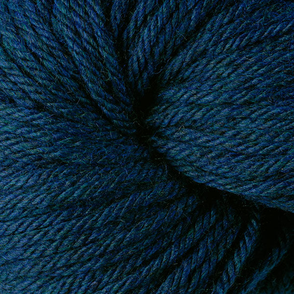 Berroco Vintage Chunky weight yarn in the color Tide Pool 6185, a dark heather with greens & blues.