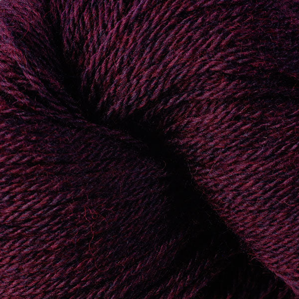Berroco Vintage DK weight yarn in the color Black Currant 2182, a heathered burgundy.