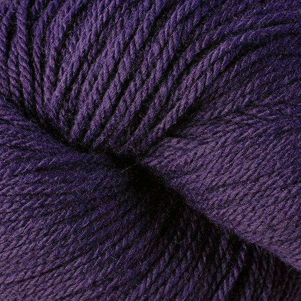 Berroco Vintage DK weight yarn in the color Petunia 21105, a dark purple.