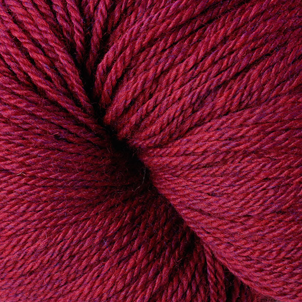 Berroco Vintage DK weight yarn in the color Ruby 21181, a rich heathered red.
