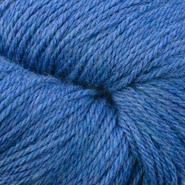 Berroco Vintage DK weight yarn in the color Sapphire 2116, a vibrant heathered blue.