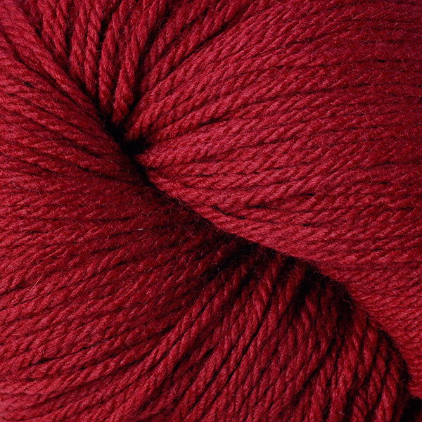 Berroco Vintage DK weight yarn in the color Sour Cherry 2134, a bright deep candy red.