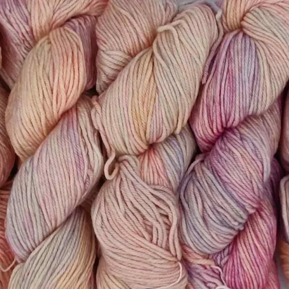 closeup of some of the best yarn in a beautiful peach color