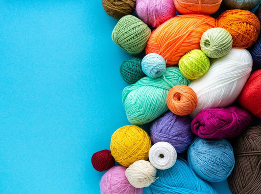 different types of yarn for crochet in a variety of colors