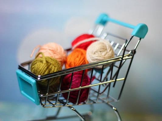 miniature trolley with yarn inside for the concept of the best place to buy yarn