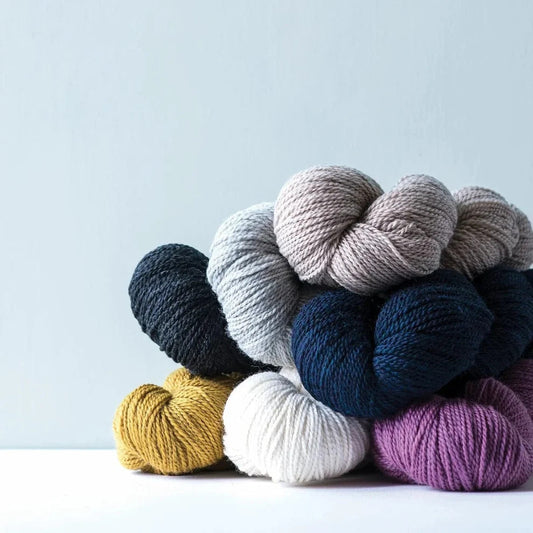 wool yarn in various colors to show what DK weight yarn is