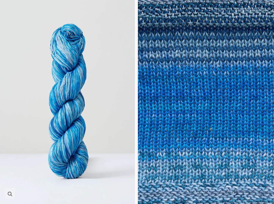 Color 1072: a hand-dyed skein of self striping cotton yarn with blue, green, and grey shades