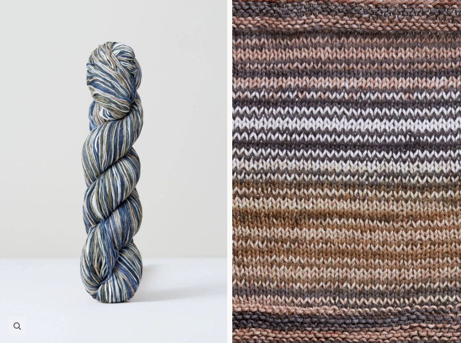 Color 1079: a hand-dyed skein of self striping cotton yarn with grey, brown, and white shades