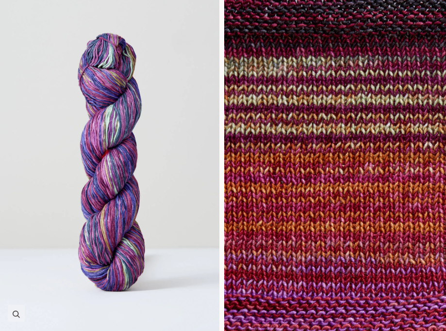 Color 1084: a hand-dyed skein of self striping cotton yarn with blue, pink, purple, and tan shades.