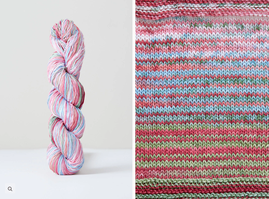 Color 1086: a hand-dyed skein of self striping cotton yarn in shades of pink and off-white.