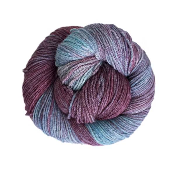 Ball of variegated yarn in shades of purple and blue.
