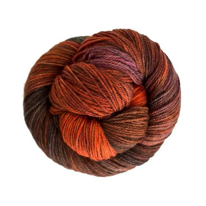 Ball of orange, brown, and purple yarn.