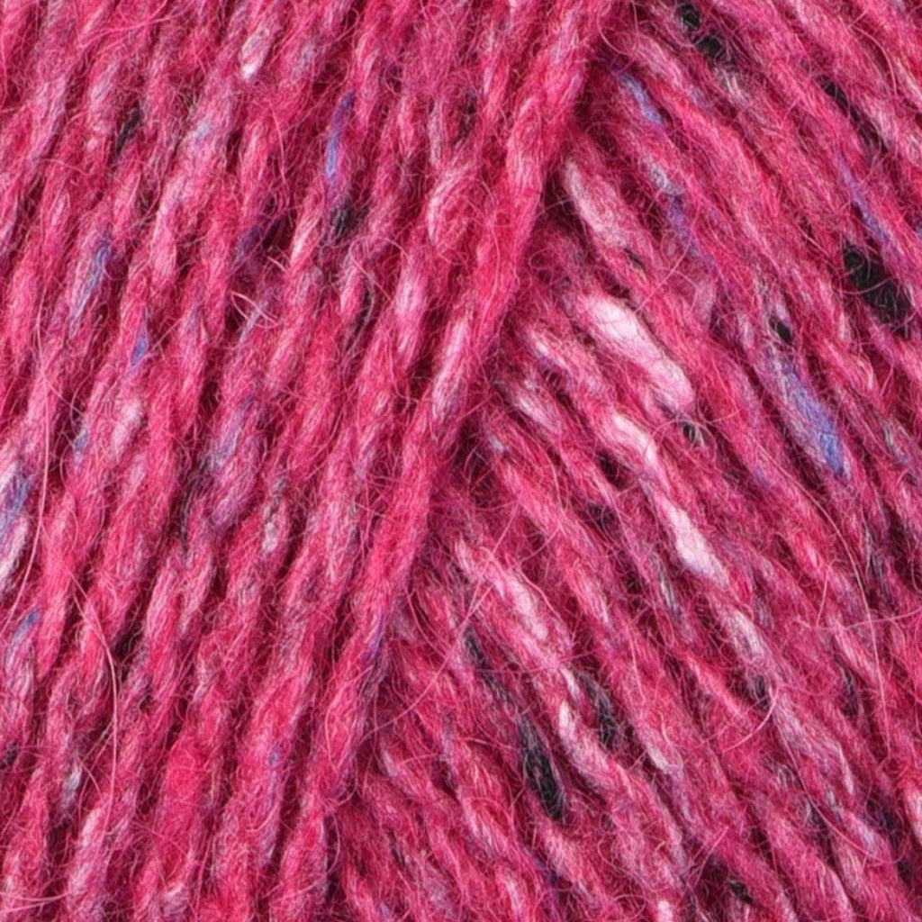 Barbara 200: A heathered tweed yarn in a deep pink color with flecks of black, blue and white.