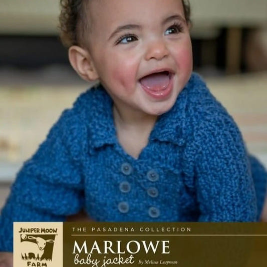 Baby wearing Juniper Moon Marlowe jacket