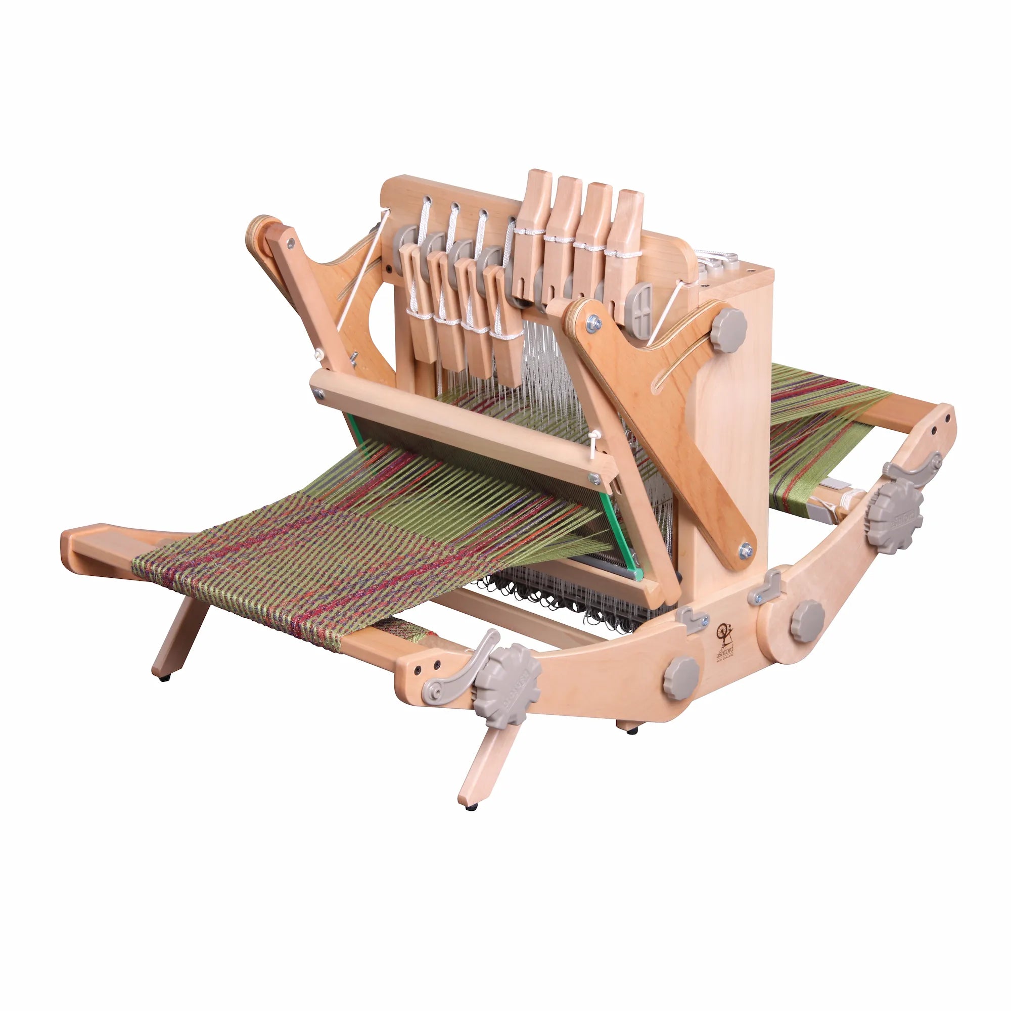 Wooden weaving loom with colorful fabric on a white background