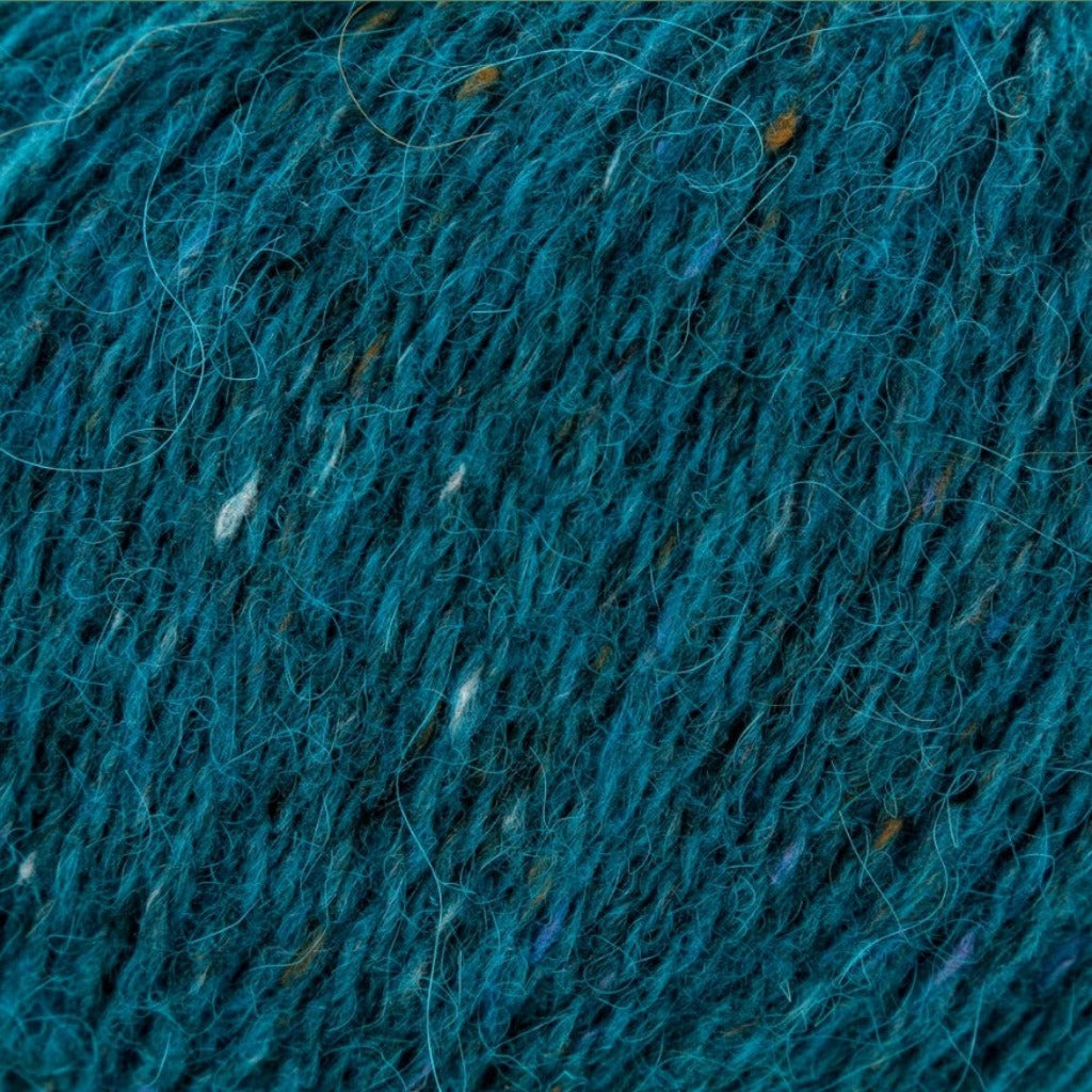 Turquoise 202: A heathered tweed yarn in a deep turquoise color with flecks of orange and white.