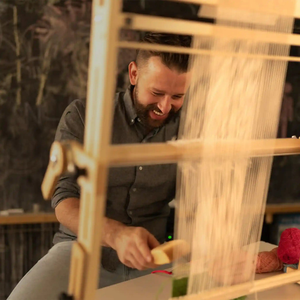 Weaver working at the Arras Tapestry Loom