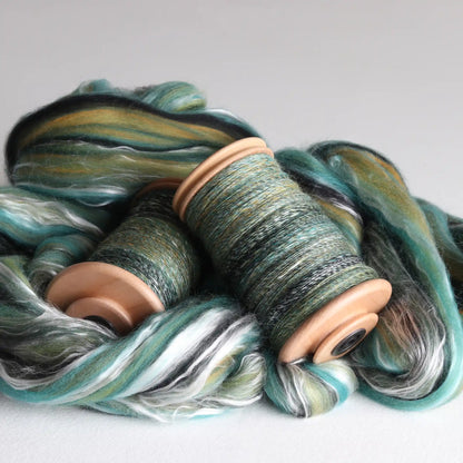 Ashford double drive Standard Bobbins filled with handspun yarn