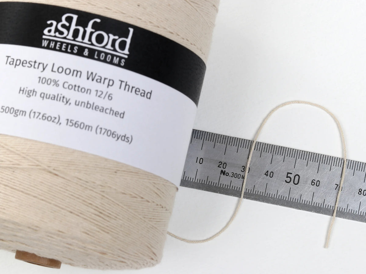Ashford Tapestry Loom Warp Thread 12/6 against a ruler