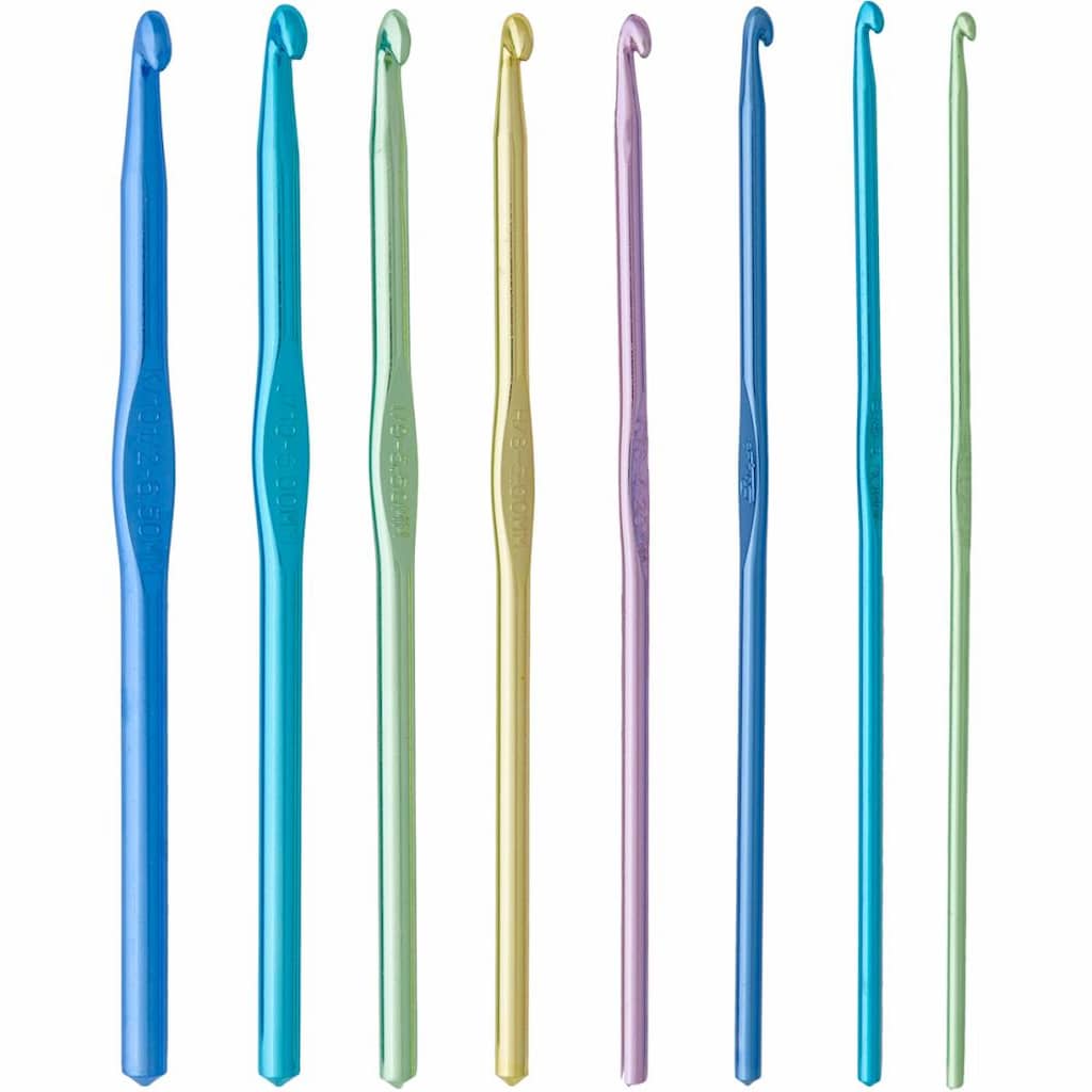 A set of eight differently colored crochet hooks side by side.