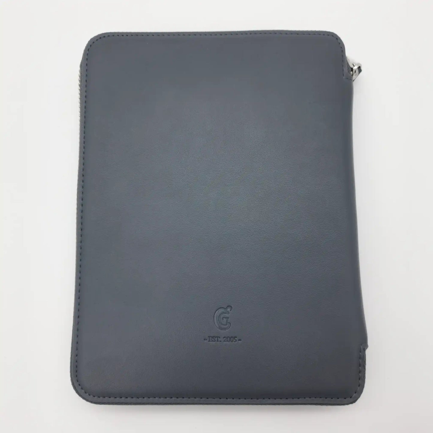 Closed charcoal ChiaoGoo Forté 2.0 case, back exterior with embossed CG monogram and Est. 2005