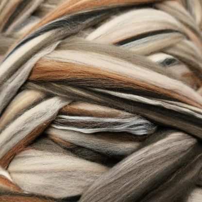 Close up of Chocolate Malt Sand Silk blend top showing sand mulberry silk reading tone on tone with the merino
