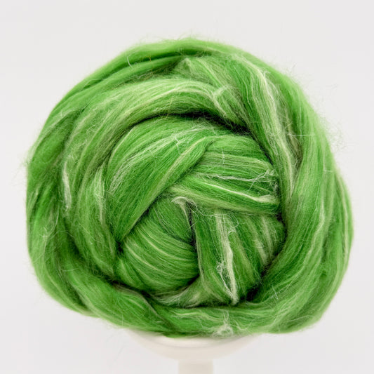 Clover Fields silk, flax and merino spinning fiber in bright green with pale silk streaks