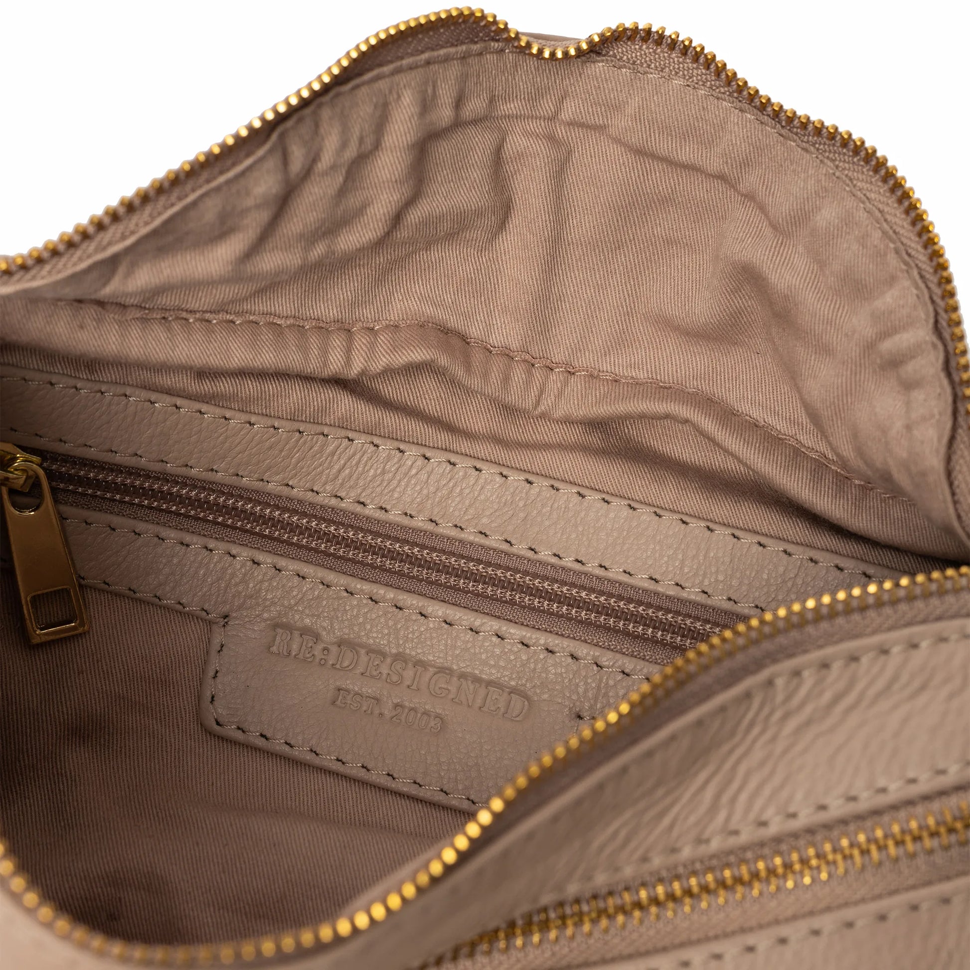 Taupe Faust Bag showing stamped RE:DESIGNED logo inside, and open view of inside