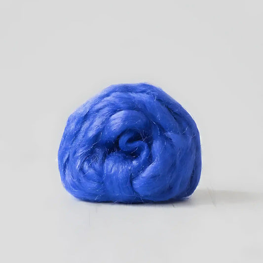 Coil of royal blue Firestar nylon top sparkle fiber by Paradise Fibers