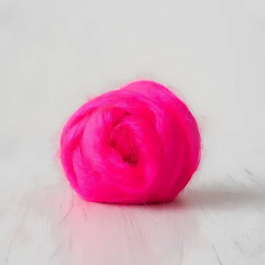 Coil of hot pink Firestar nylon top sparkle fiber by Paradise Fibers