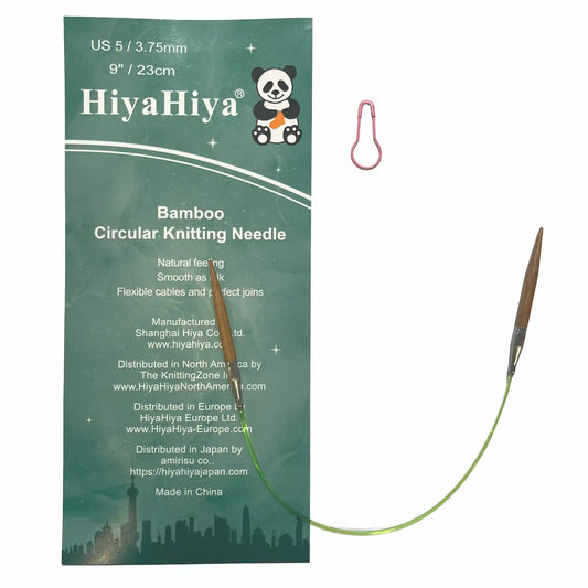 9In HiyaHiya Bamboo Knitting Needle shown against a white background with one included stitch marker and card insert