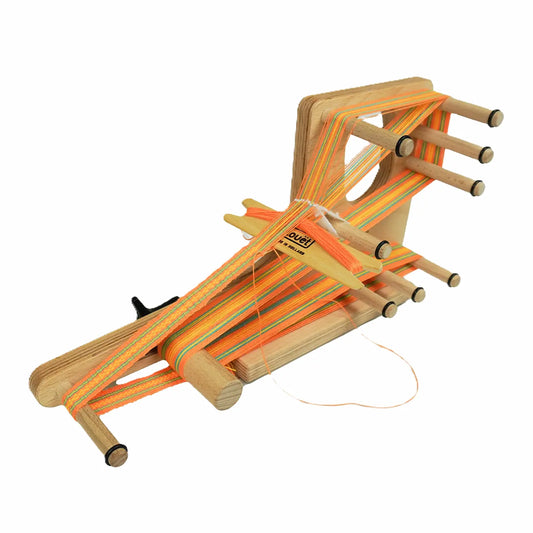 Louet Mini inkle loom warped in orange with the shuttle in the shed