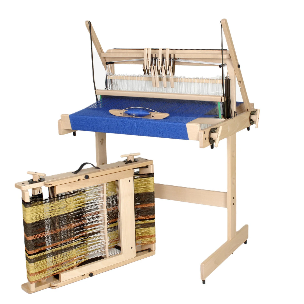 Louet Jane 8 shaft table loom on its floor stand beside a second Jane folded flat with the warp still on