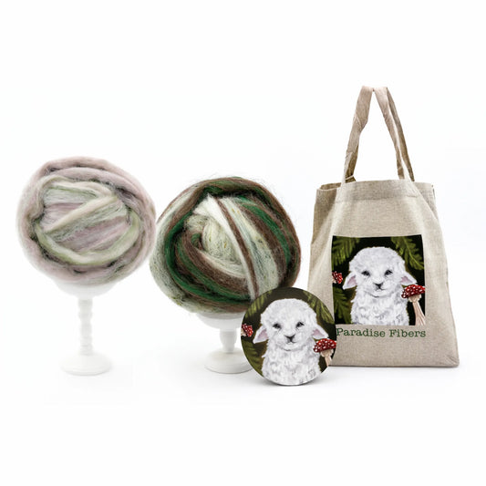 March Fiber Club, showcasing two fiber blends, a tote bag, and a sticker