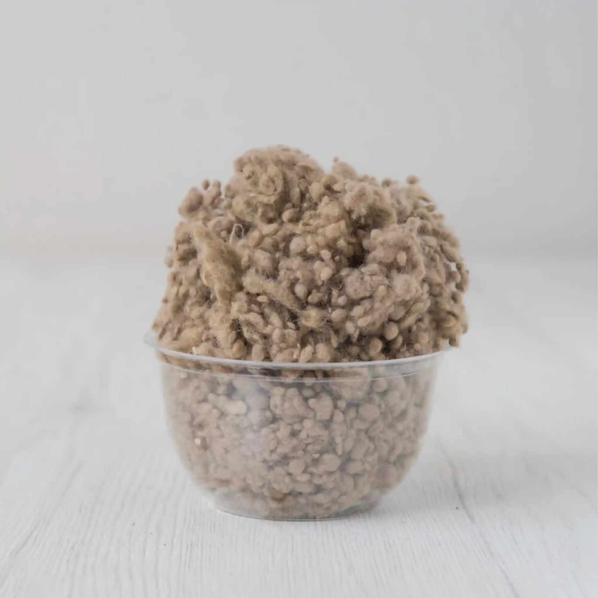 Merino wool nepps in Earth, small entangled fiber balls