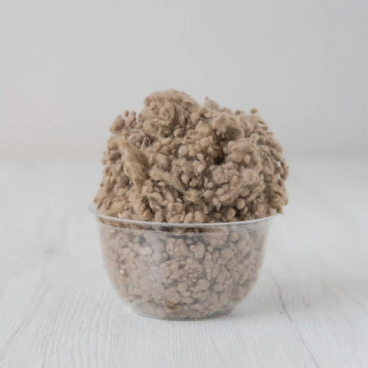 Merino wool nepps in Earth, small entangled fiber balls