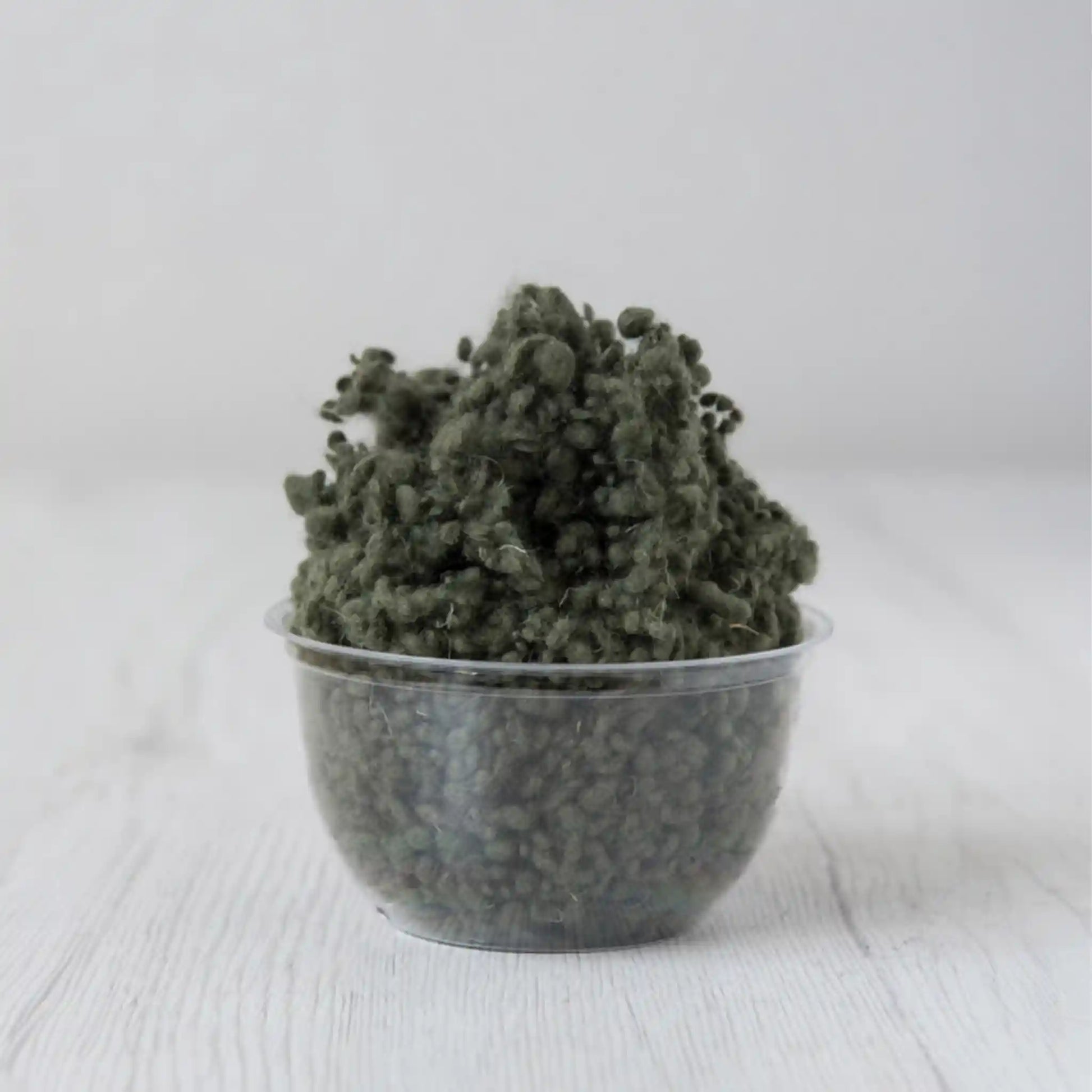Merino wool nepps in Moss, small entangled fiber balls