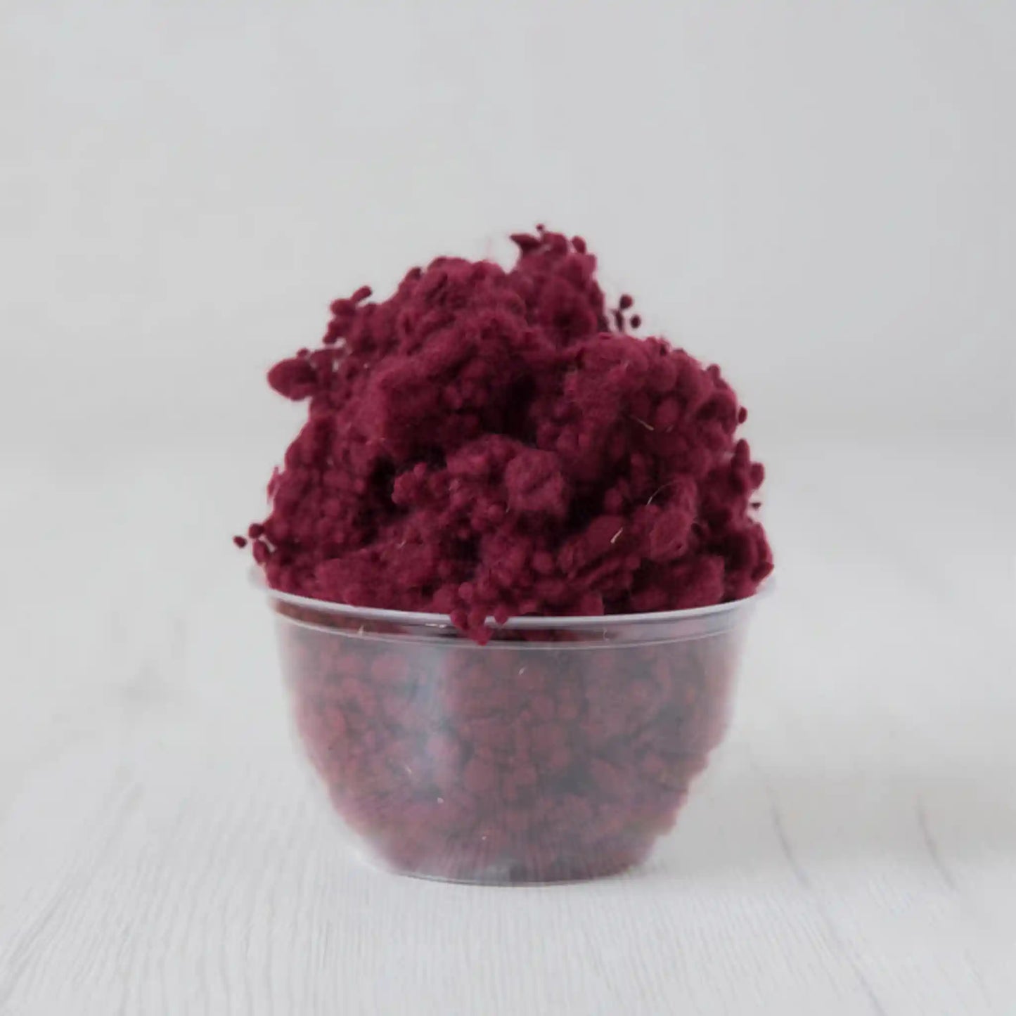 Merino wool nepps in Soft Fruit, small entangled fiber balls