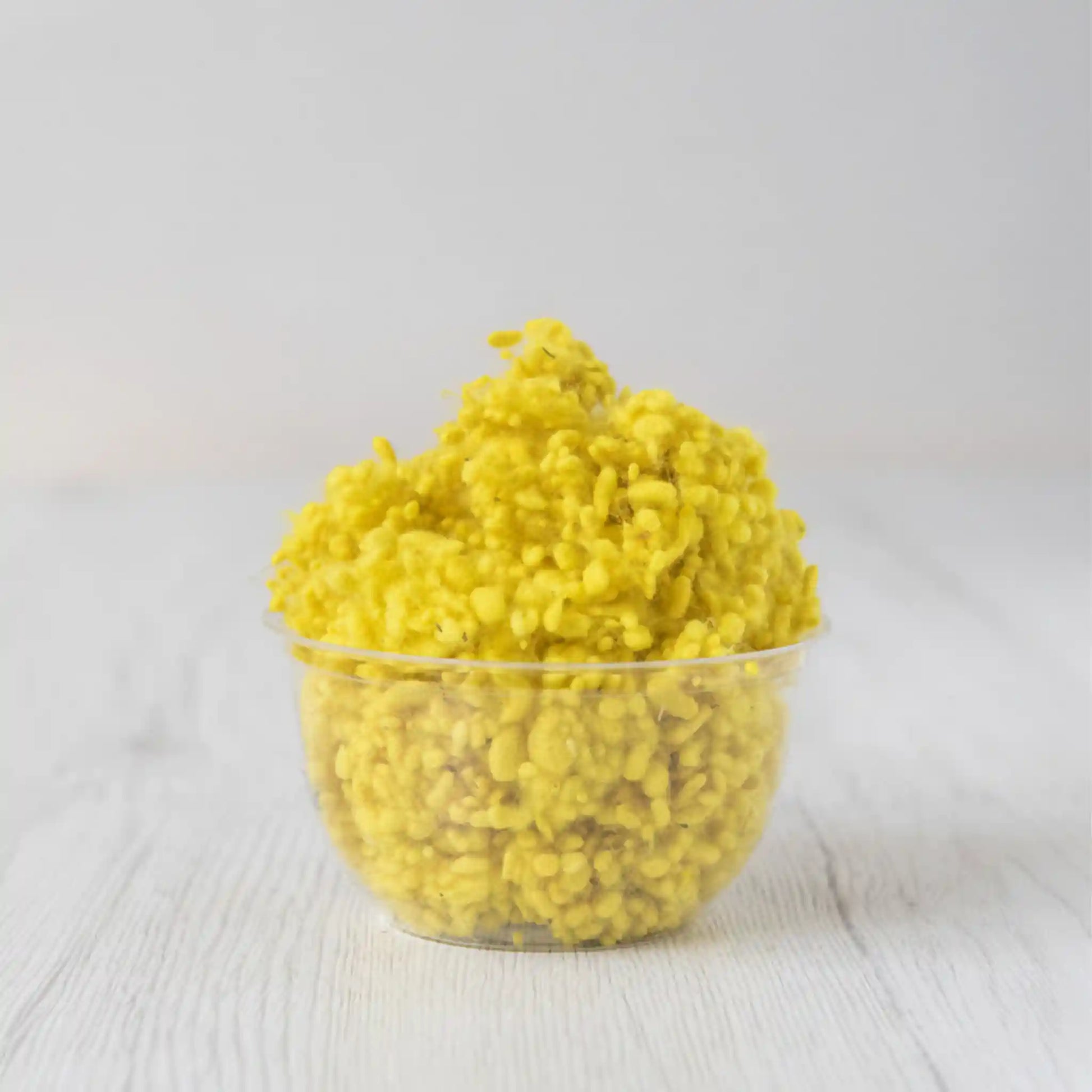 Merino wool nepps in Sun, small entangled fiber balls