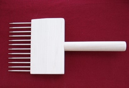 Glimakra tapestry beater, a hardwood weaving comb with twelve metal teeth