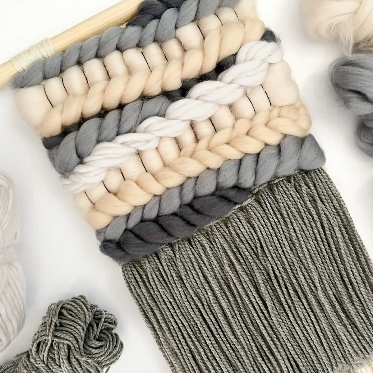 Woven wall hanging made with the Mono Mix palette from the Paradise Fibers Weaver's Collection Mixed Bag - Mono Mix