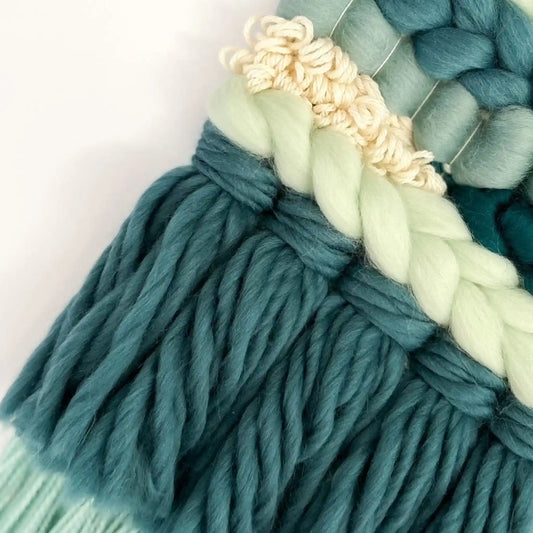 Woven wall hanging made with the Subtle Seaside palette from the Paradise Fibers Weaver's Collection Mixed Bag - Subtle Seaside