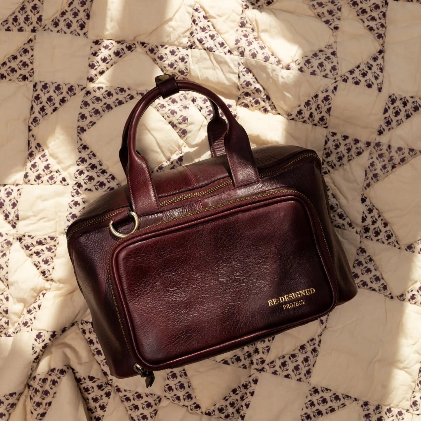 RE:DESIGNED Project 39 Small Project Bag in Dark Cherry leather, lifestyle