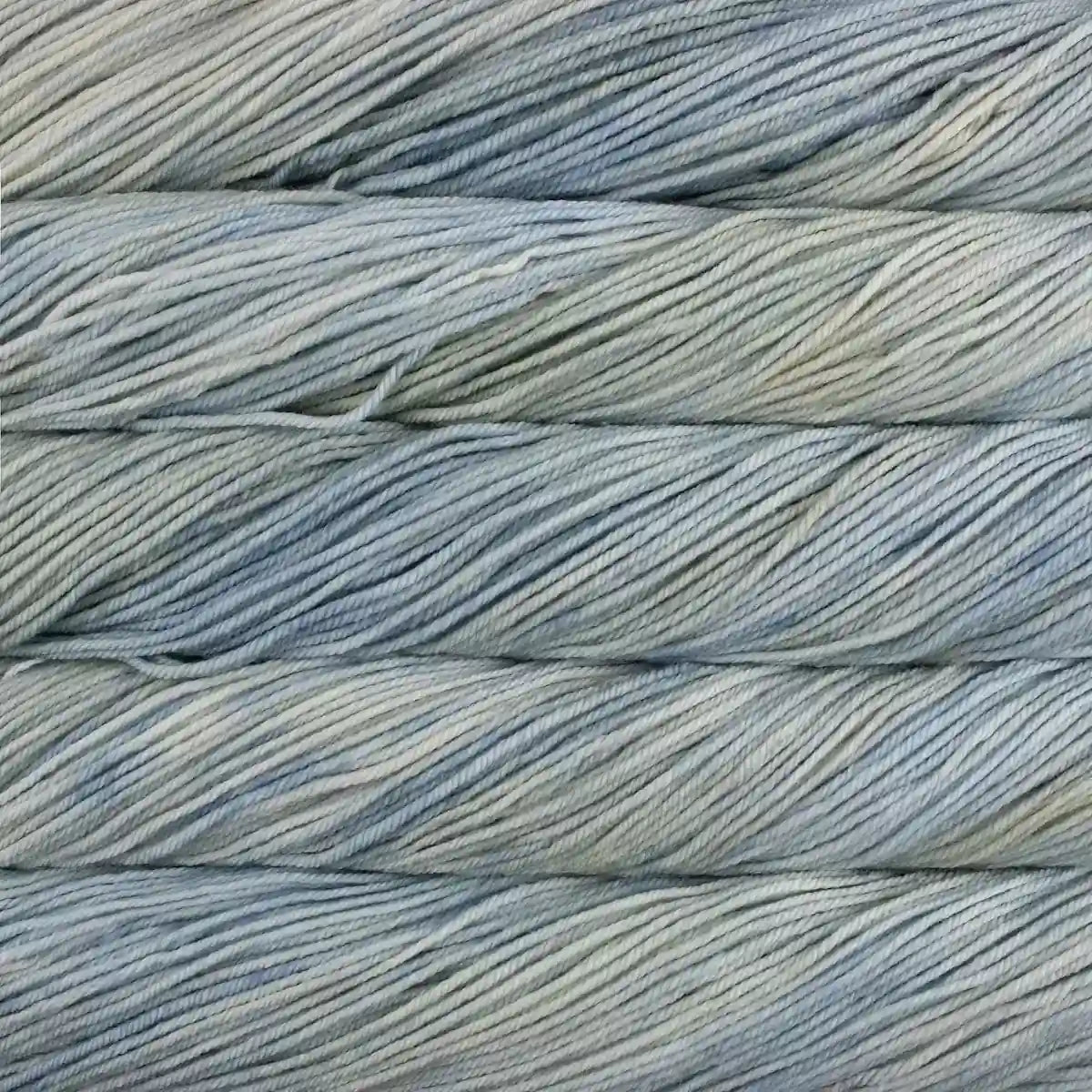 Close-up of yarn with a gray and bluish variegated color