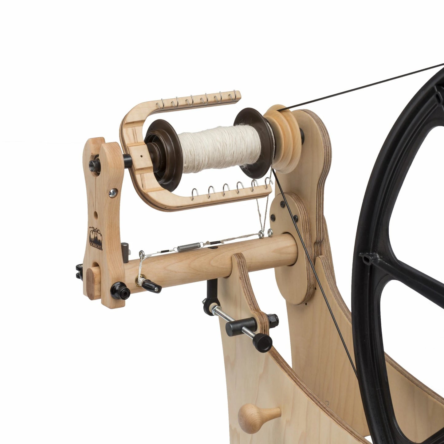 Zoomed out view of the Schacht Flatiron Spinning Wheels flyer, showcasing the tension assembly.