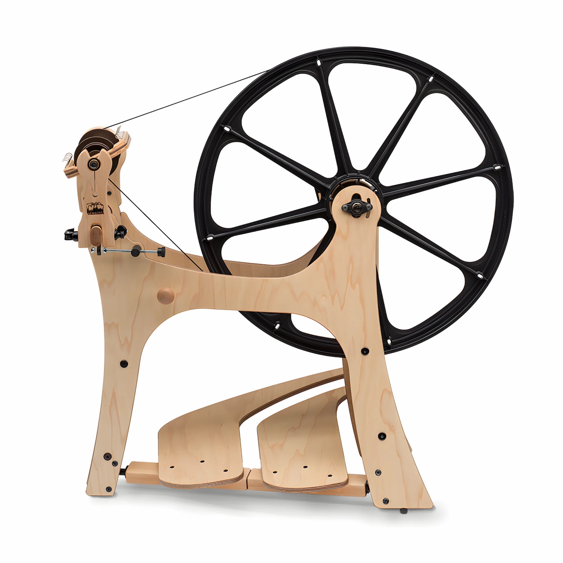 Schacht Flatiron Spinning Wheel showing the flyer, drive wheel, treadles, and overall shape