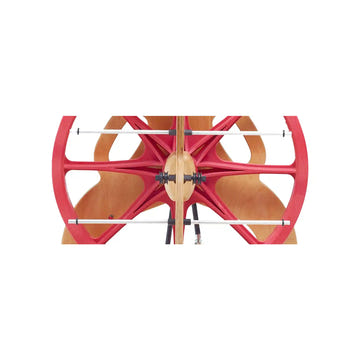 Close-up of the Schacht Ladybug Lazy Kate rods and bobbin spacers in the wheel frame